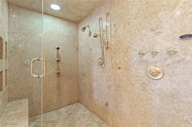 bathroom with an enclosed shower