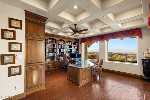 office area with baseboards, built in desk, a ceiling fan, dark wood-type flooring, and coffered ceiling