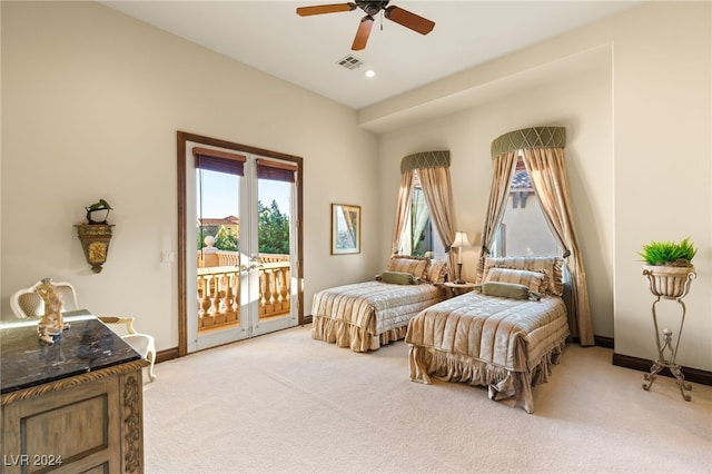 bedroom with access to outside, light colored carpet, baseboards, and visible vents