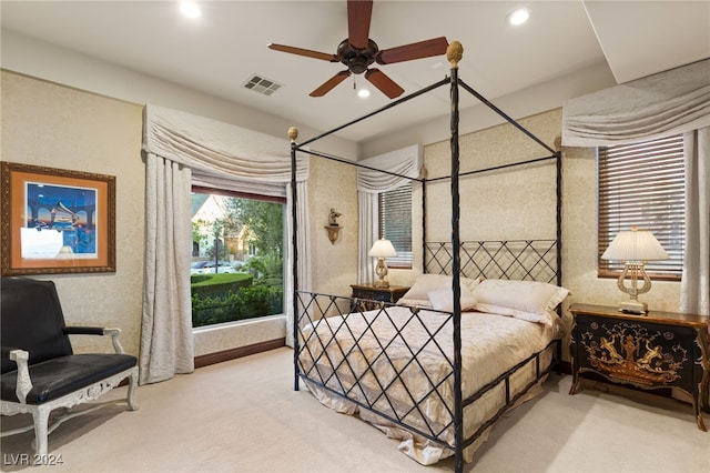 carpeted bedroom with visible vents and recessed lighting
