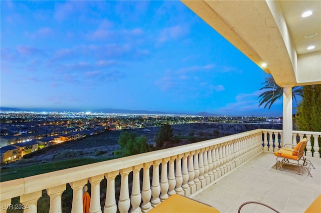 view of balcony at dusk