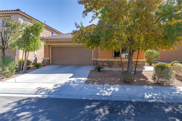 view of front of home with a garage