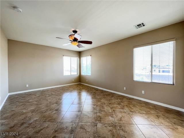 empty room with ceiling fan