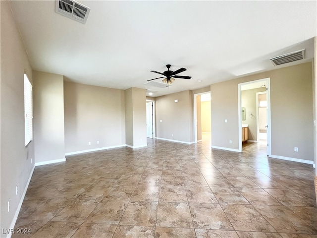 empty room featuring ceiling fan