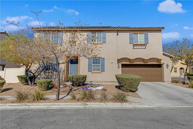 view of front of property featuring a garage