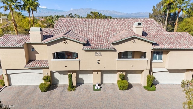 view of front of property with a mountain view