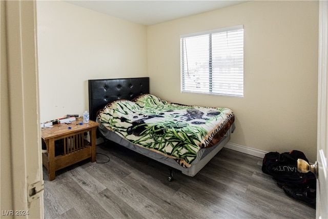 bedroom featuring wood-type flooring