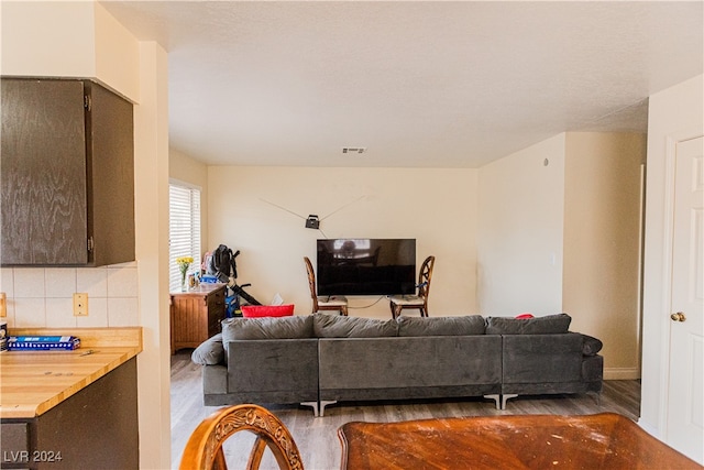 living room with hardwood / wood-style flooring