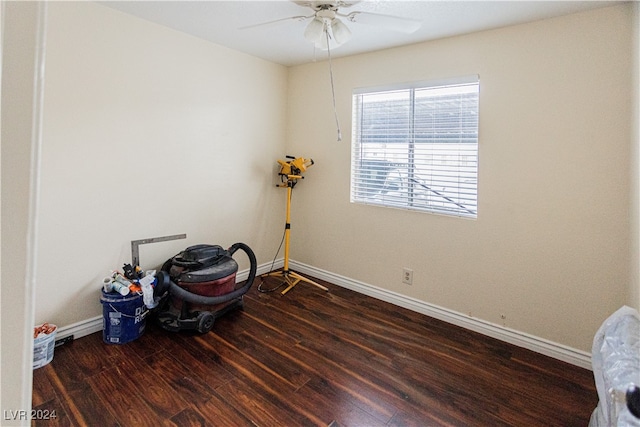 misc room with ceiling fan and dark hardwood / wood-style floors