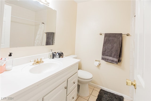 bathroom with tile patterned floors, vanity, toilet, and a shower with shower curtain