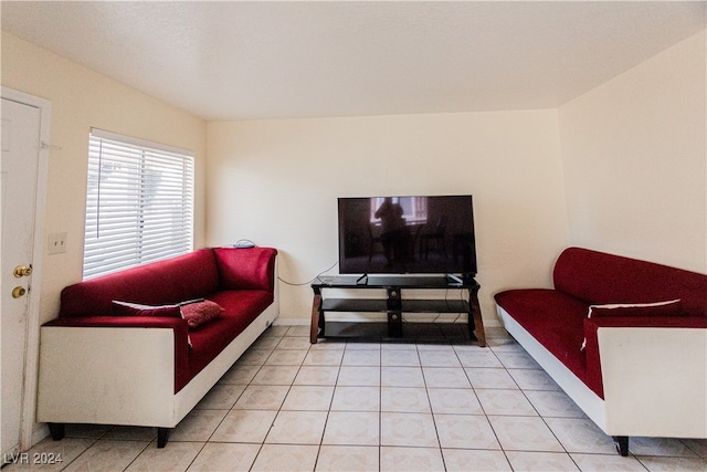 living room with light tile patterned floors