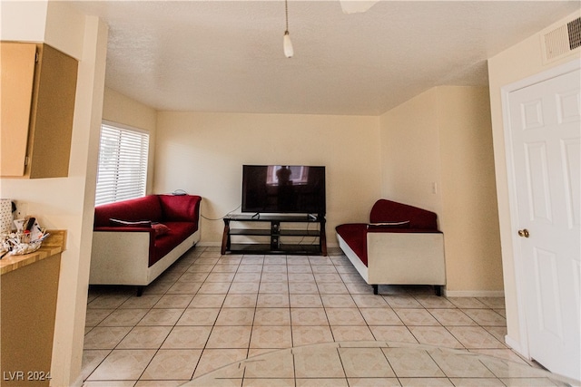 living room featuring light tile patterned flooring