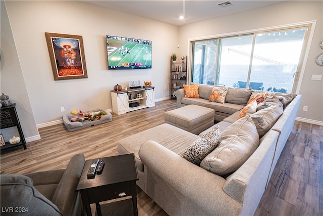 living room with hardwood / wood-style floors