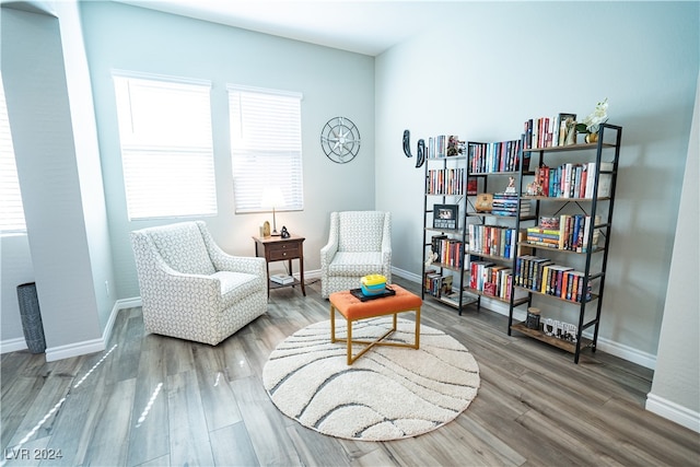 living area featuring hardwood / wood-style floors