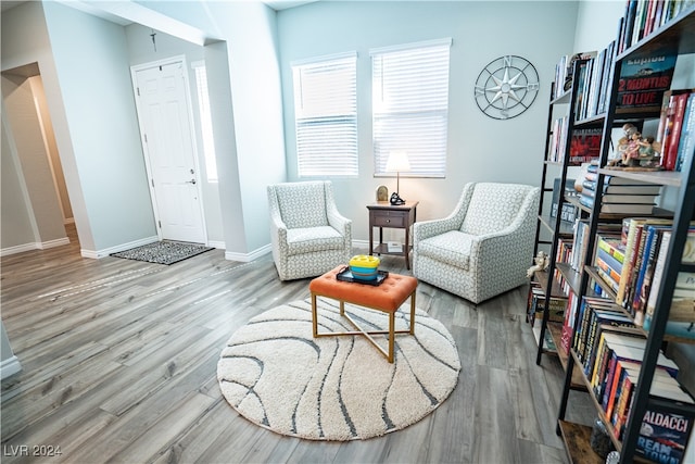 living area featuring hardwood / wood-style floors