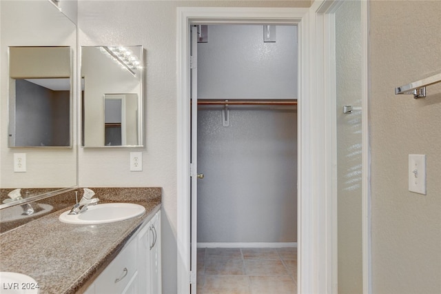 bathroom featuring vanity and tile patterned floors