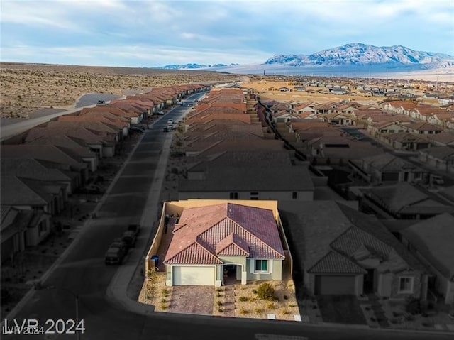 drone / aerial view featuring a mountain view