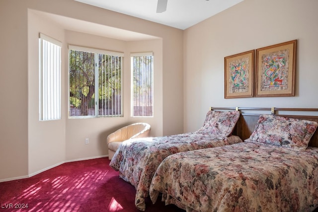 bedroom with ceiling fan and carpet