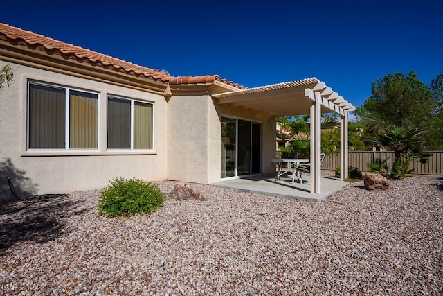 back of house featuring a patio area