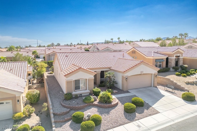 mediterranean / spanish-style house featuring a garage