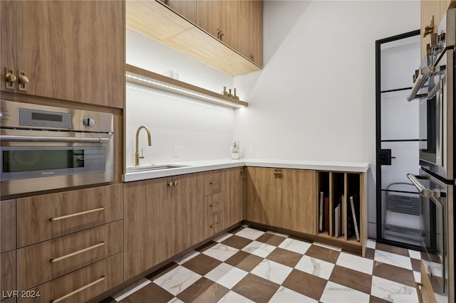 kitchen with sink and oven