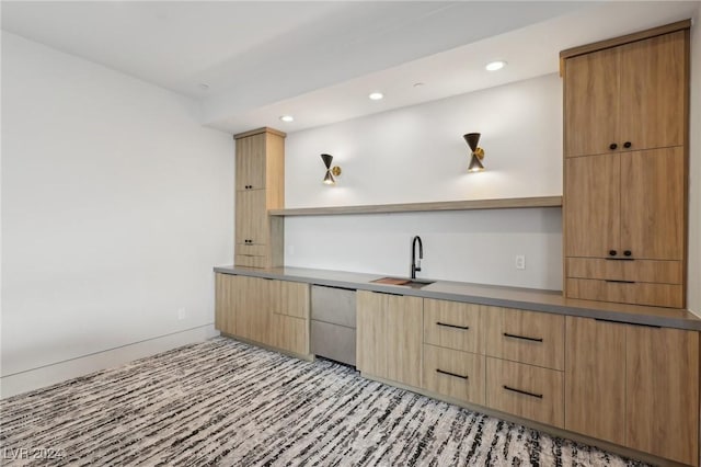 kitchen with dishwasher and sink