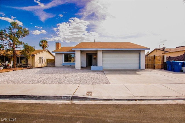 single story home with a garage