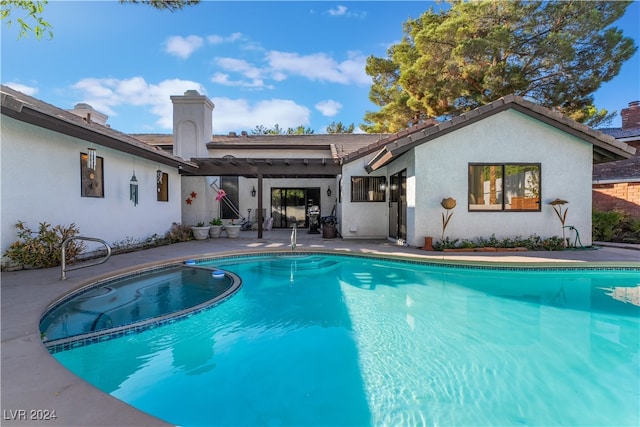 view of swimming pool featuring a patio and a pergola