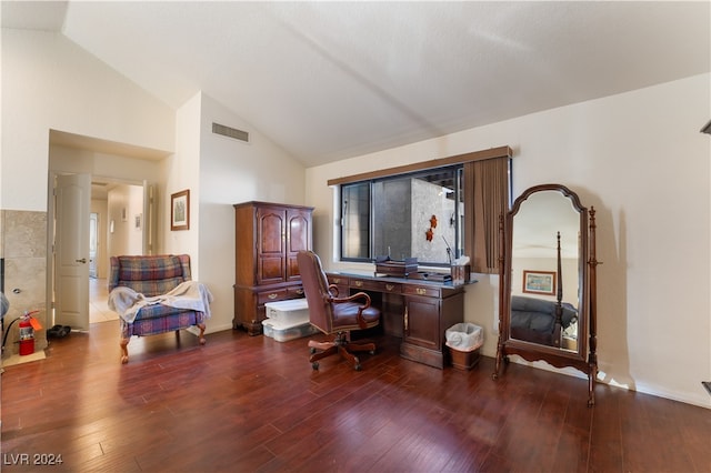 home office with dark wood-type flooring and high vaulted ceiling