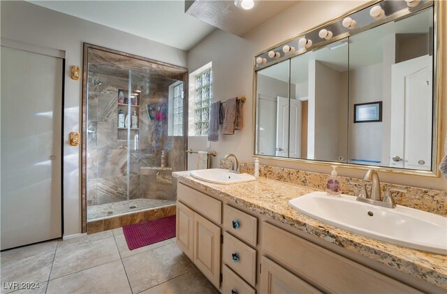 2504 Windjammer Way, Las Vegas, NV 89107 - bathroom featuring double vanity, a shower stall, and tile patterned flooring