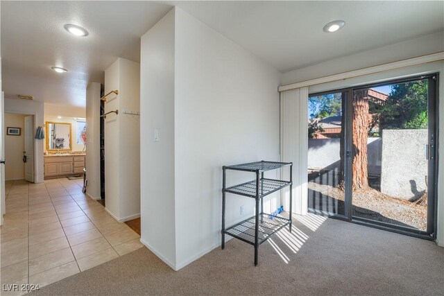 2504 Windjammer Way, Las Vegas, NV 89107 - unfurnished dining area featuring light carpet, recessed lighting, and light tile patterned flooring