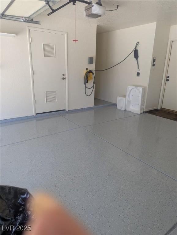 2504 Windjammer Way, Las Vegas, NV 89107 - garage with a garage door opener