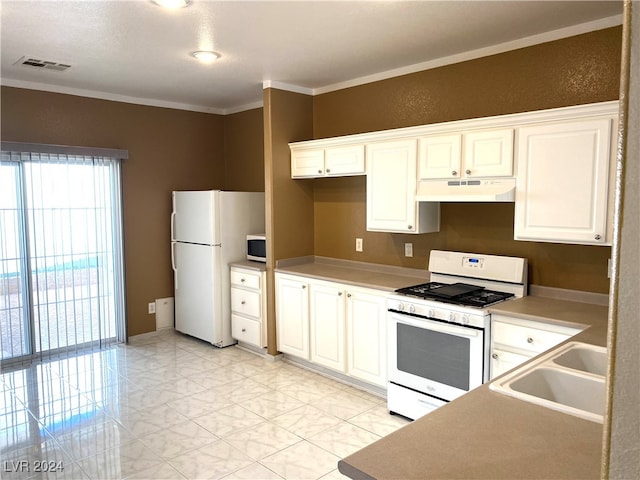 kitchen featuring ornamental molding, sink, white cabinetry, and white appliances