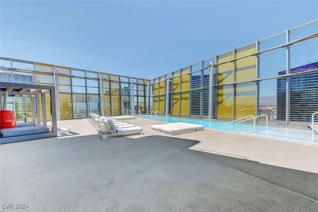 view of patio with a community pool