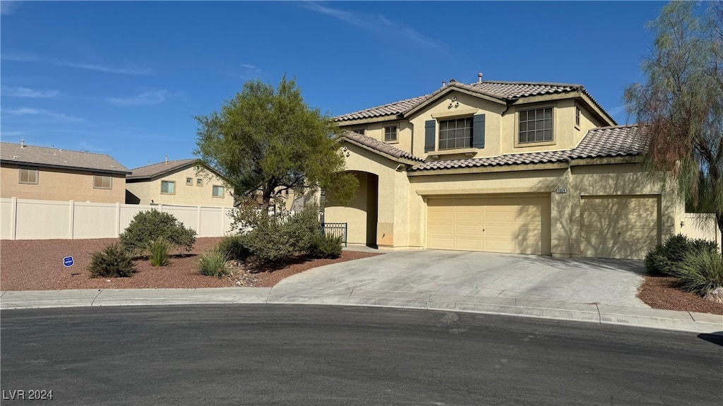 view of front of property featuring a garage