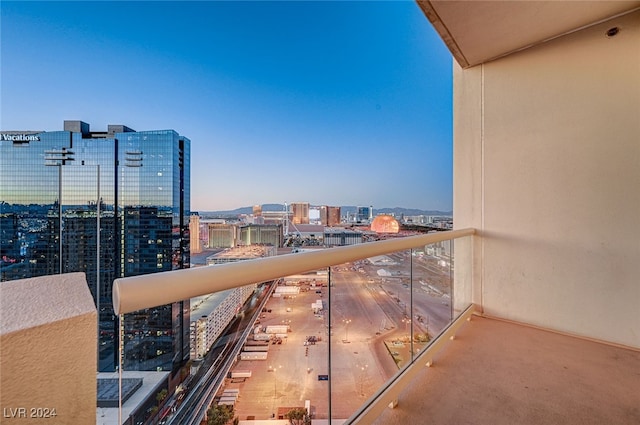 view of balcony at dusk