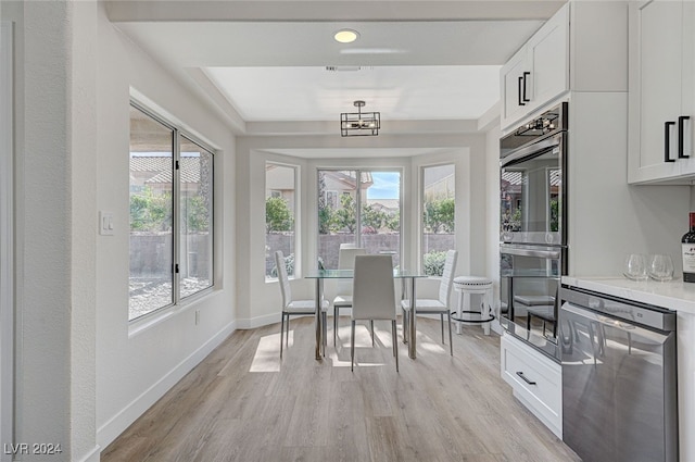 sunroom / solarium featuring plenty of natural light and visible vents