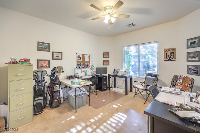 carpeted office with ceiling fan