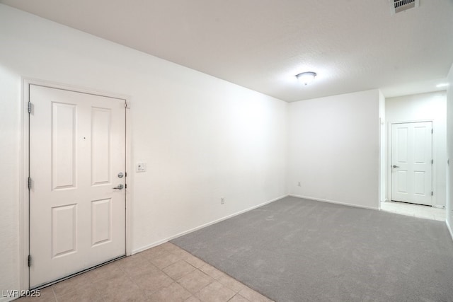 7625 Fieldfare Dr, North Las Vegas, NV 89084 - spare room featuring light carpet and baseboards