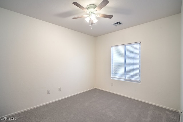 7625 Fieldfare Dr, North Las Vegas, NV 89084 - spare room with ceiling fan, dark carpet, and baseboards