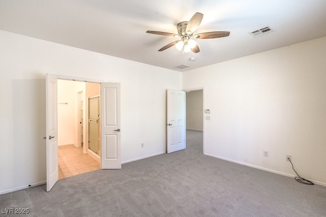 7625 Fieldfare Dr, North Las Vegas, NV 89084 - unfurnished bedroom with carpet floors, baseboards, and ceiling fan