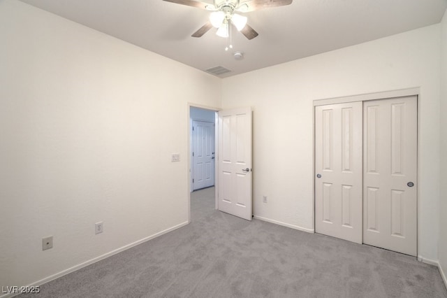 7625 Fieldfare Dr, North Las Vegas, NV 89084 - unfurnished bedroom featuring carpet flooring, baseboards, a closet, and a ceiling fan