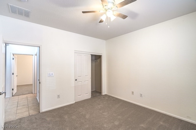 7625 Fieldfare Dr, North Las Vegas, NV 89084 - unfurnished bedroom featuring carpet floors, a closet, and baseboards