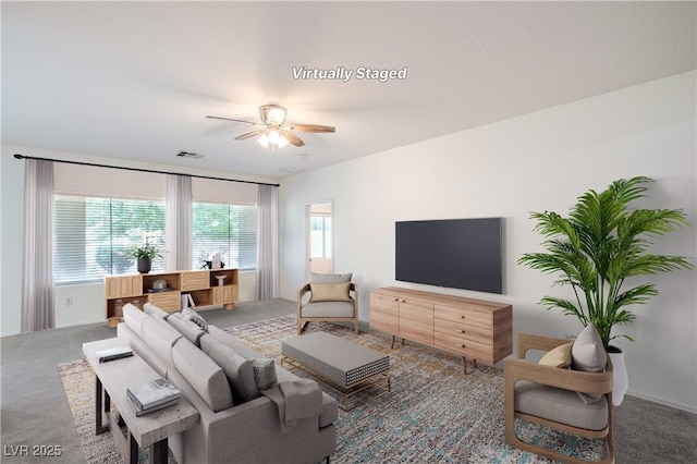 7625 Fieldfare Dr, North Las Vegas, NV 89084 - living room featuring carpet and ceiling fan