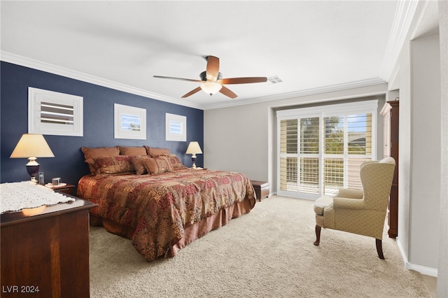 carpeted bedroom with ceiling fan and crown molding