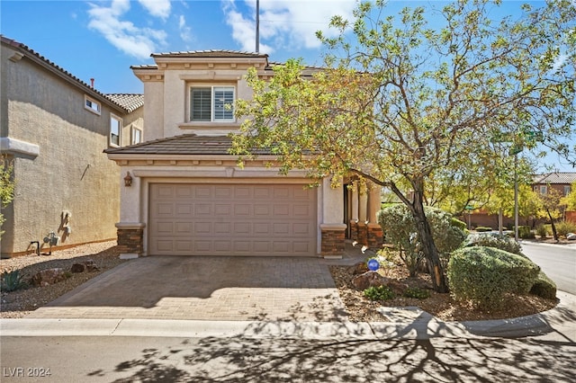 view of front of home with a garage