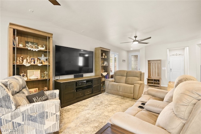 living room featuring ceiling fan