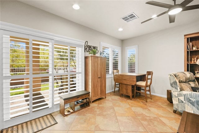 tiled office with ceiling fan