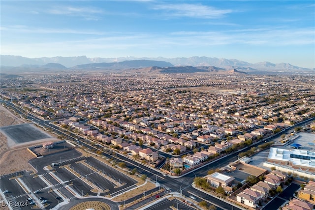 birds eye view of property featuring a mountain view