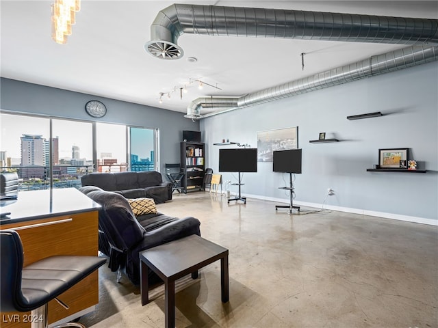 living room featuring concrete floors